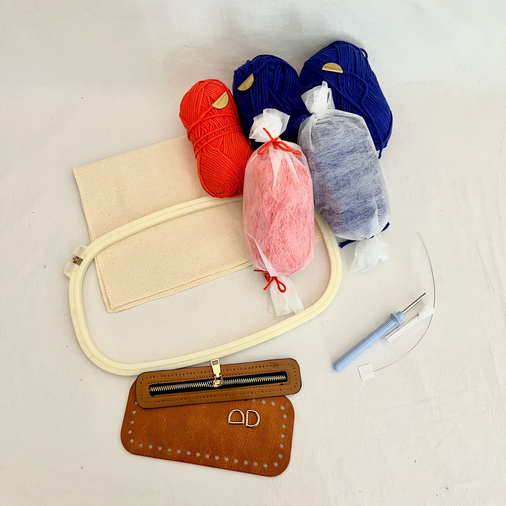 Ohpunch Pochette Lido punch needle DIY bag kit with Paris-inspired yarn colors.