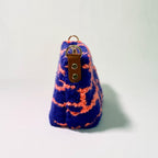 Handmade Pochette Lido crossbody punch needle bag from Ohpunch, side view.