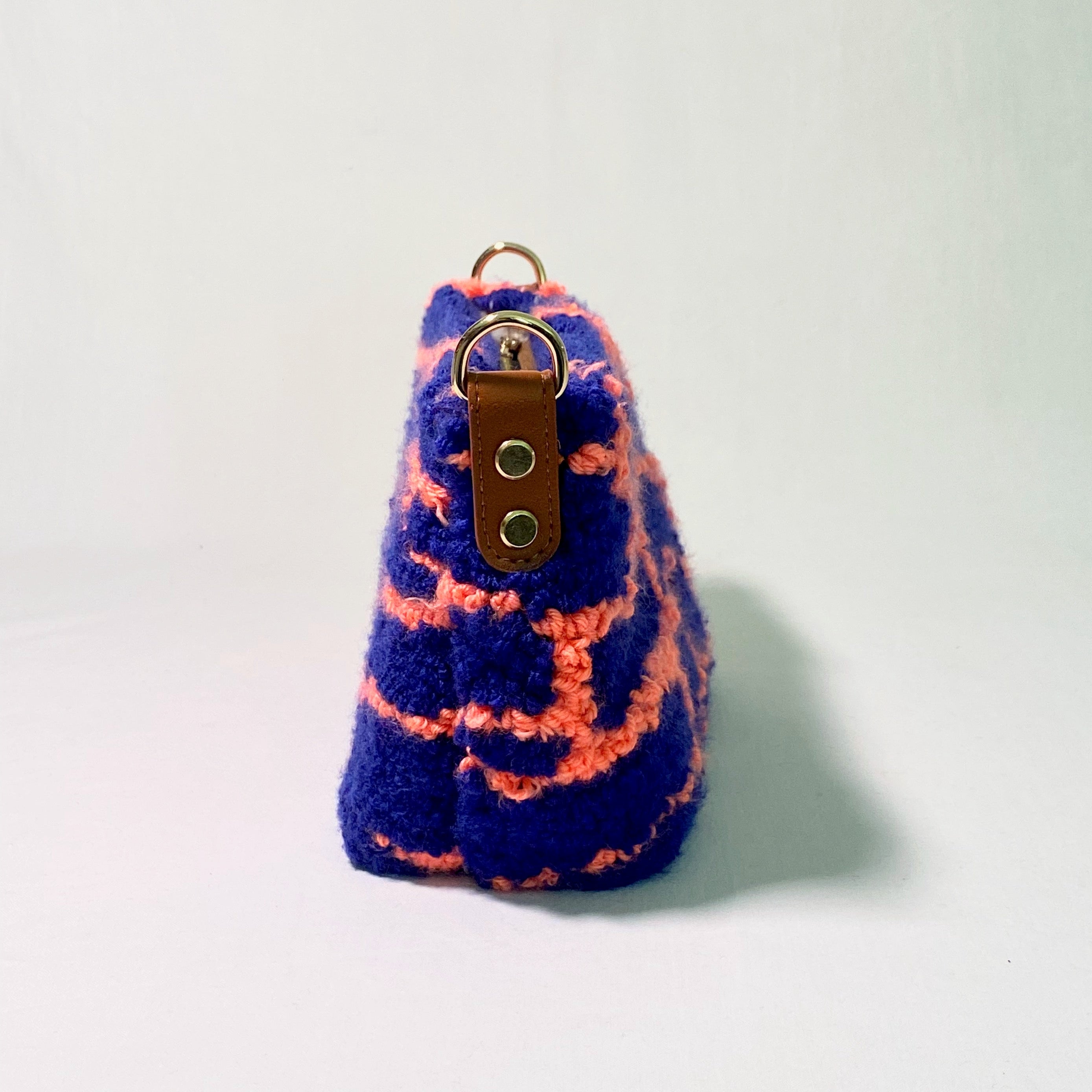 Handmade Pochette Lido crossbody punch needle bag from Ohpunch, side view.