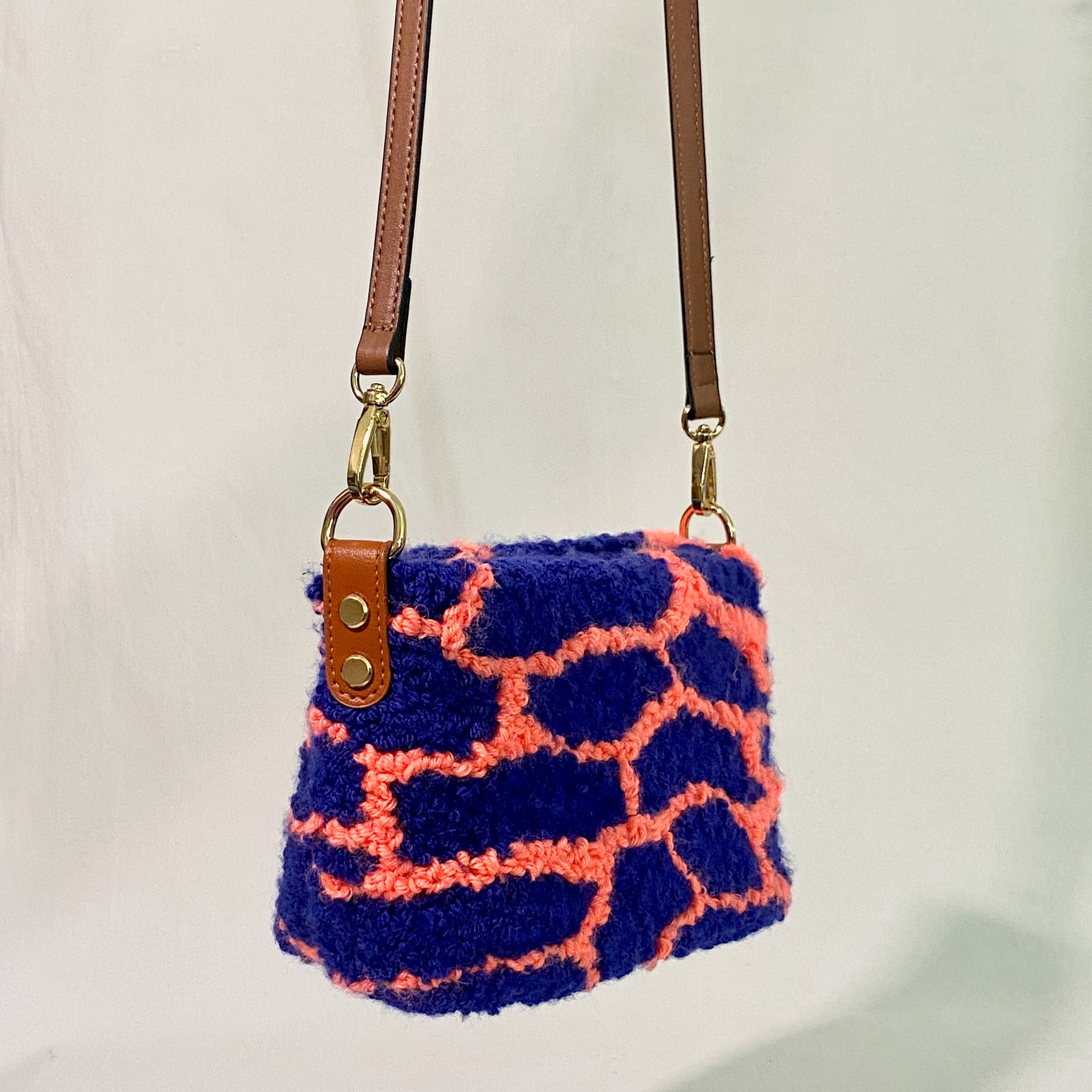 Ohpunch Pochette Lido handmade punch needle bag with strap angled view